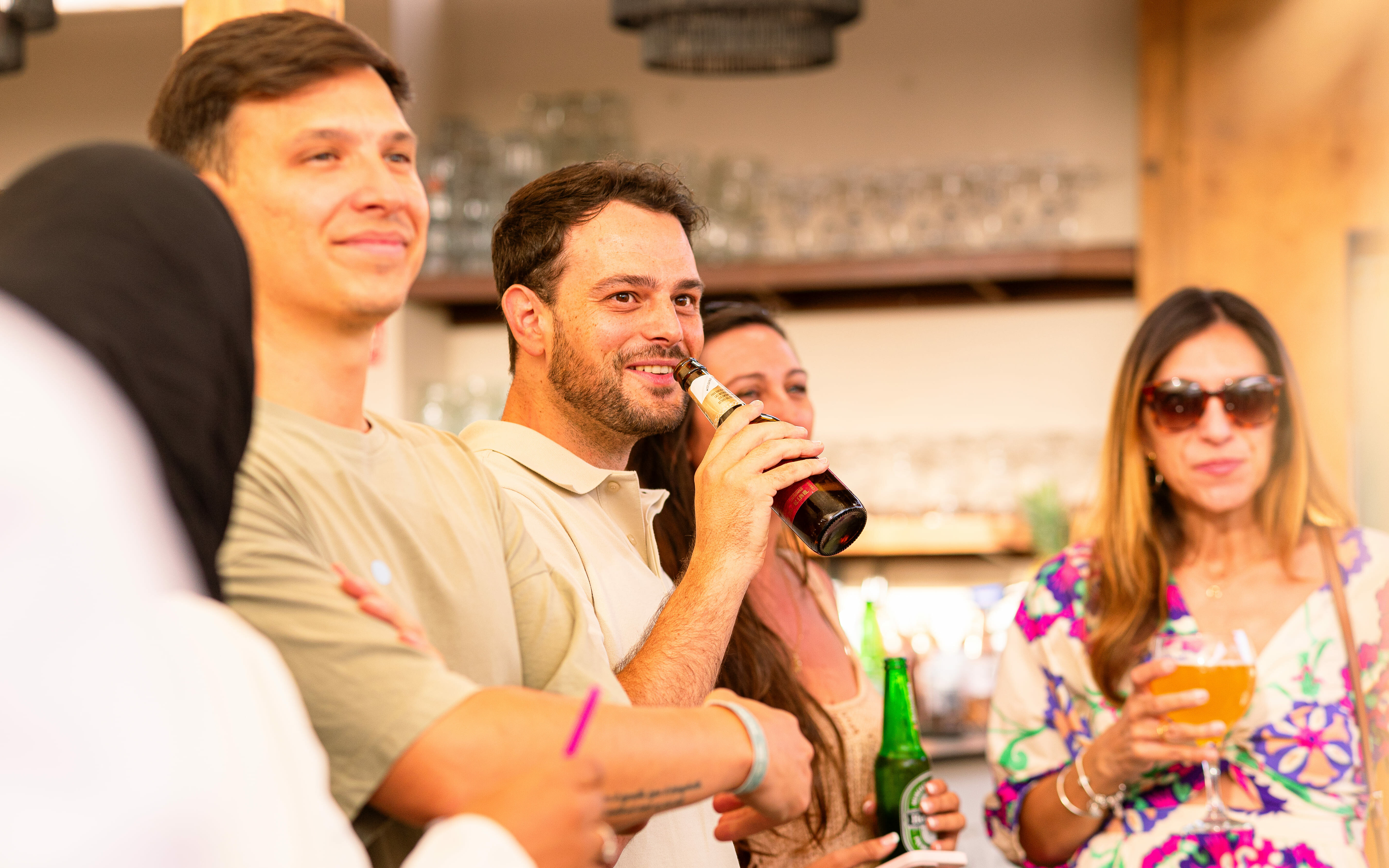 Attendees raising a toast at a Málaga Tech Terraceo
